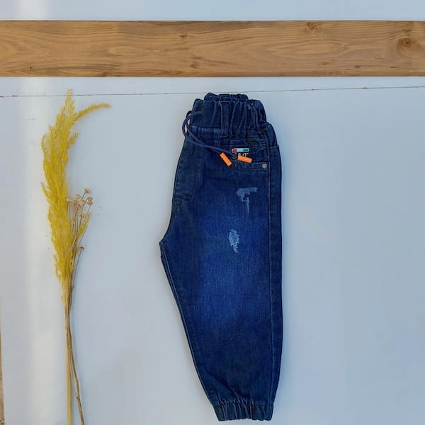 عکس-شلوار جین بچگانه دمپا تک رنگ