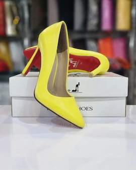 کفش پاشنه دار زنانه چرم زرد