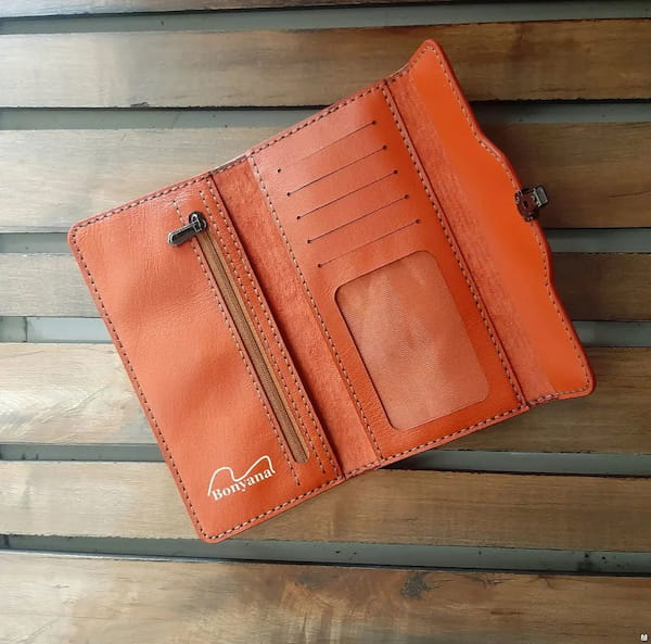 عکس-کیف پول زنانه چرم طبیعی نارنجی