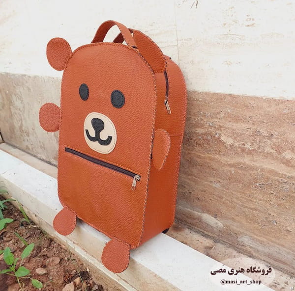 عکس-کیف بچگانه چرم نارنجی