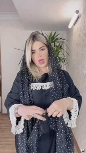 عکس-مانتو زنانه ابر و بادی مشکی